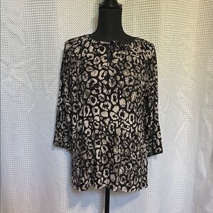 LuLaRoe Black and Cream Animal Print Blouse